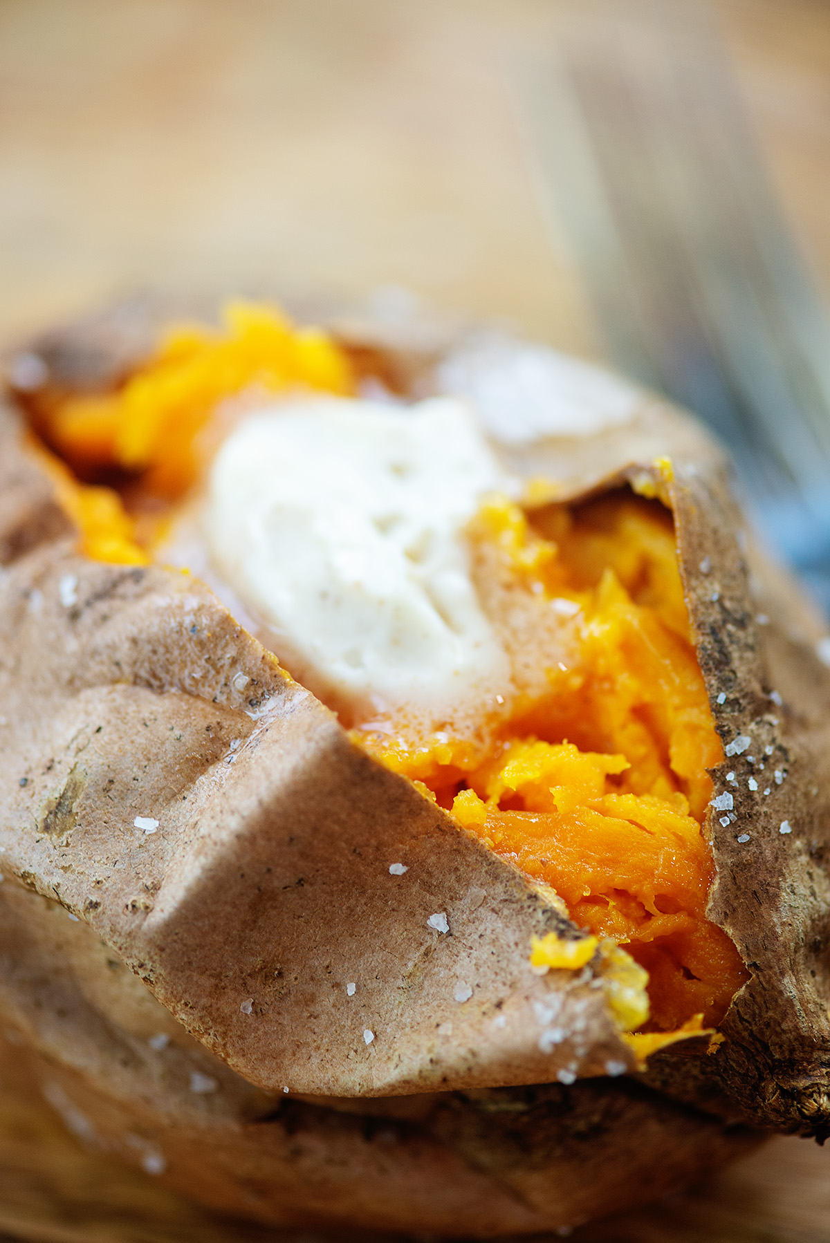 Butter melting inside of a sweet potato.