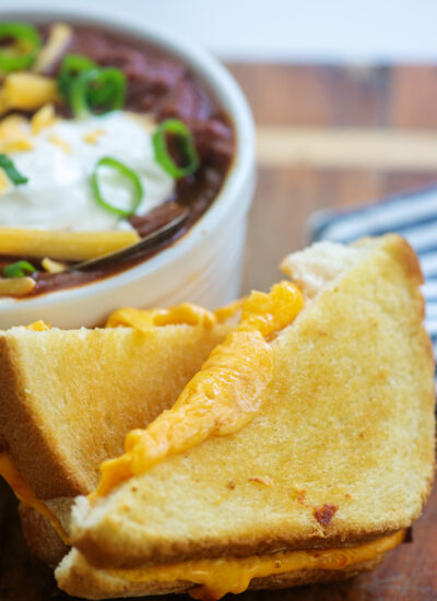 grilled cheese sandwich with bowl of chili