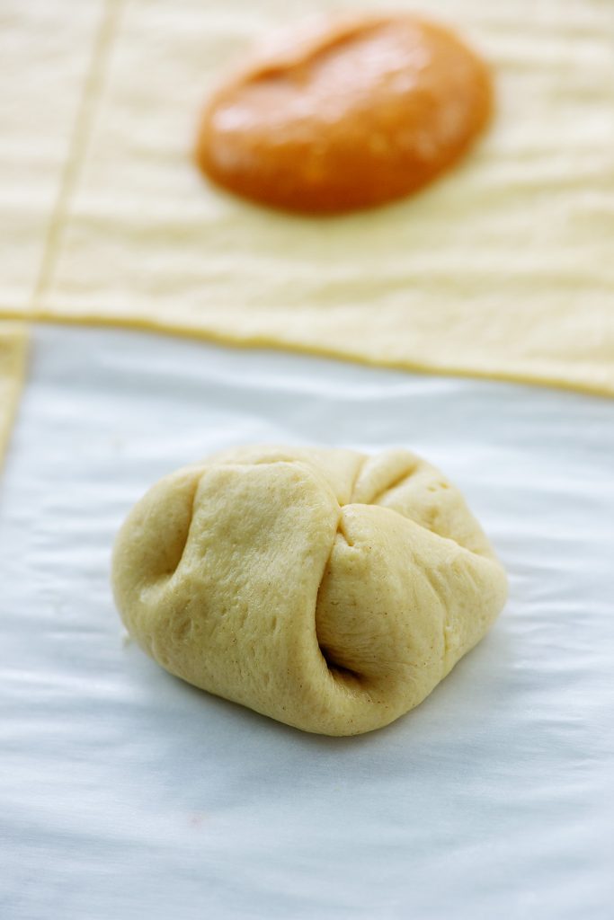 A close up of a rolled crescent dough
