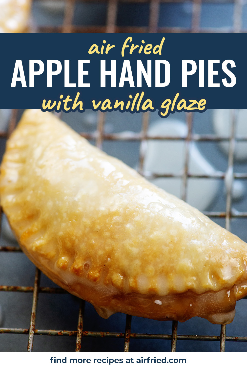 Close up of a fried apple pie on a wire cooling rack