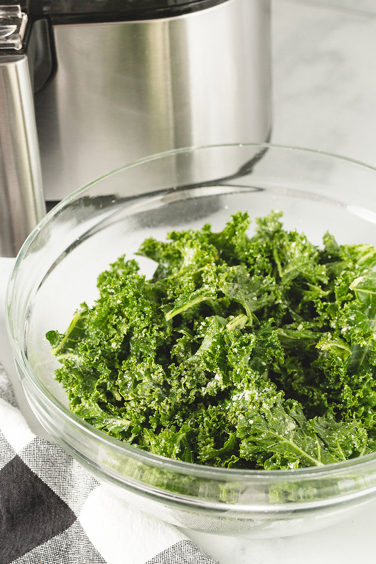 Washed kale in a clear glass bowl