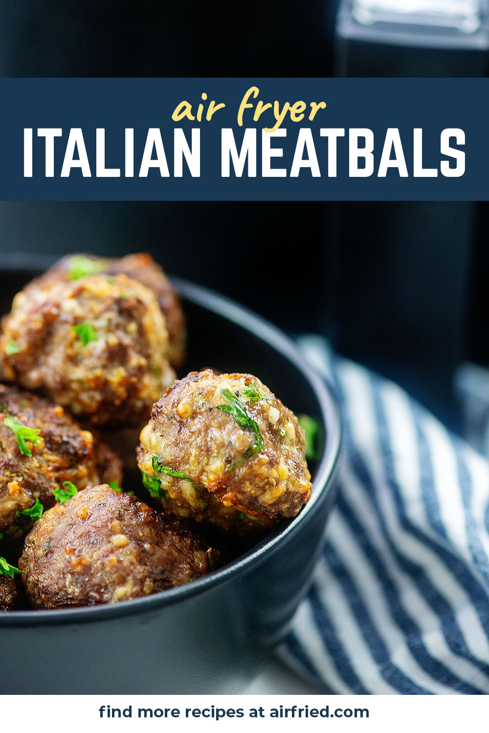 A black bowl full of italian meatballs