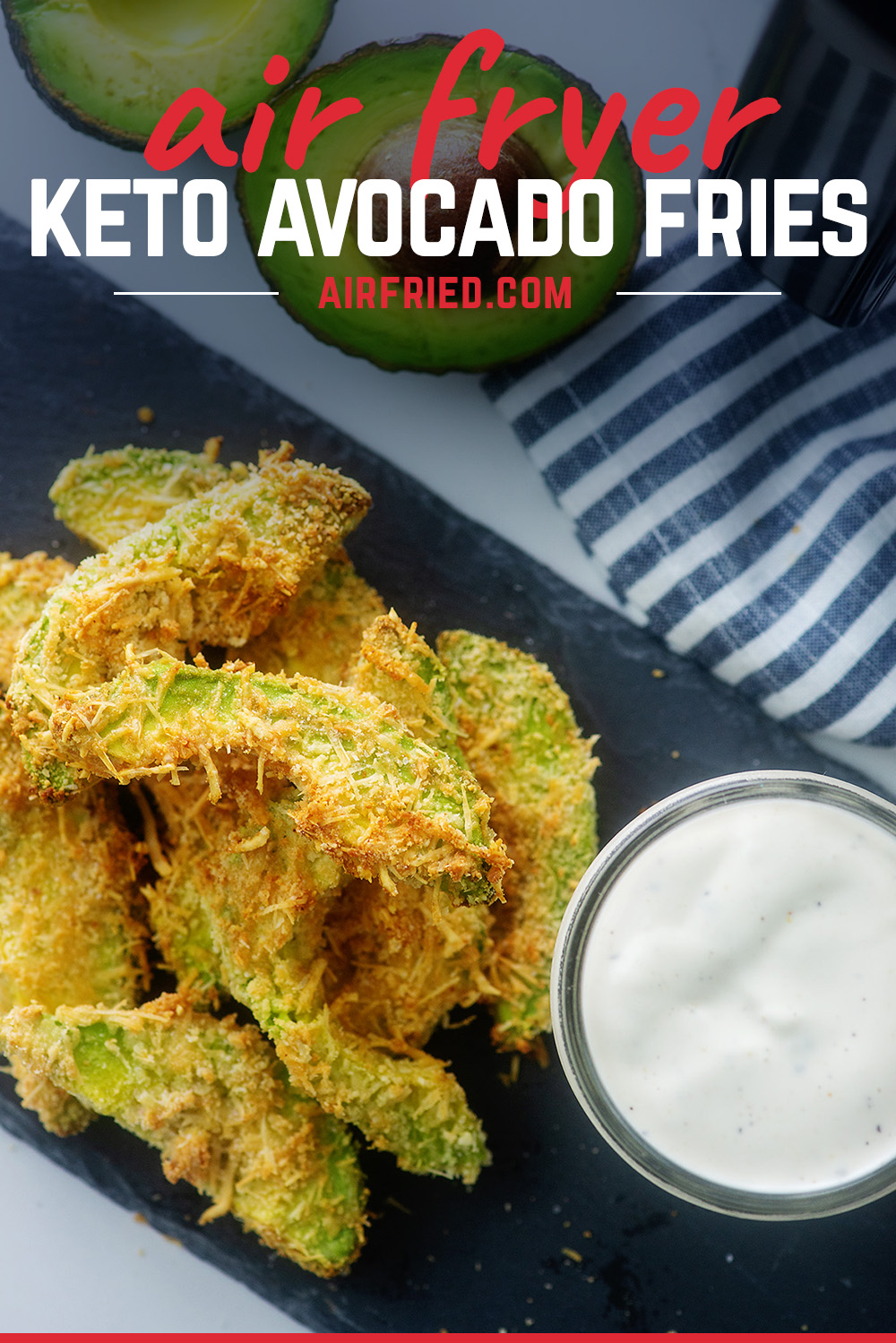 Overhead view of avocado fries next to a cup of ranch dressing.