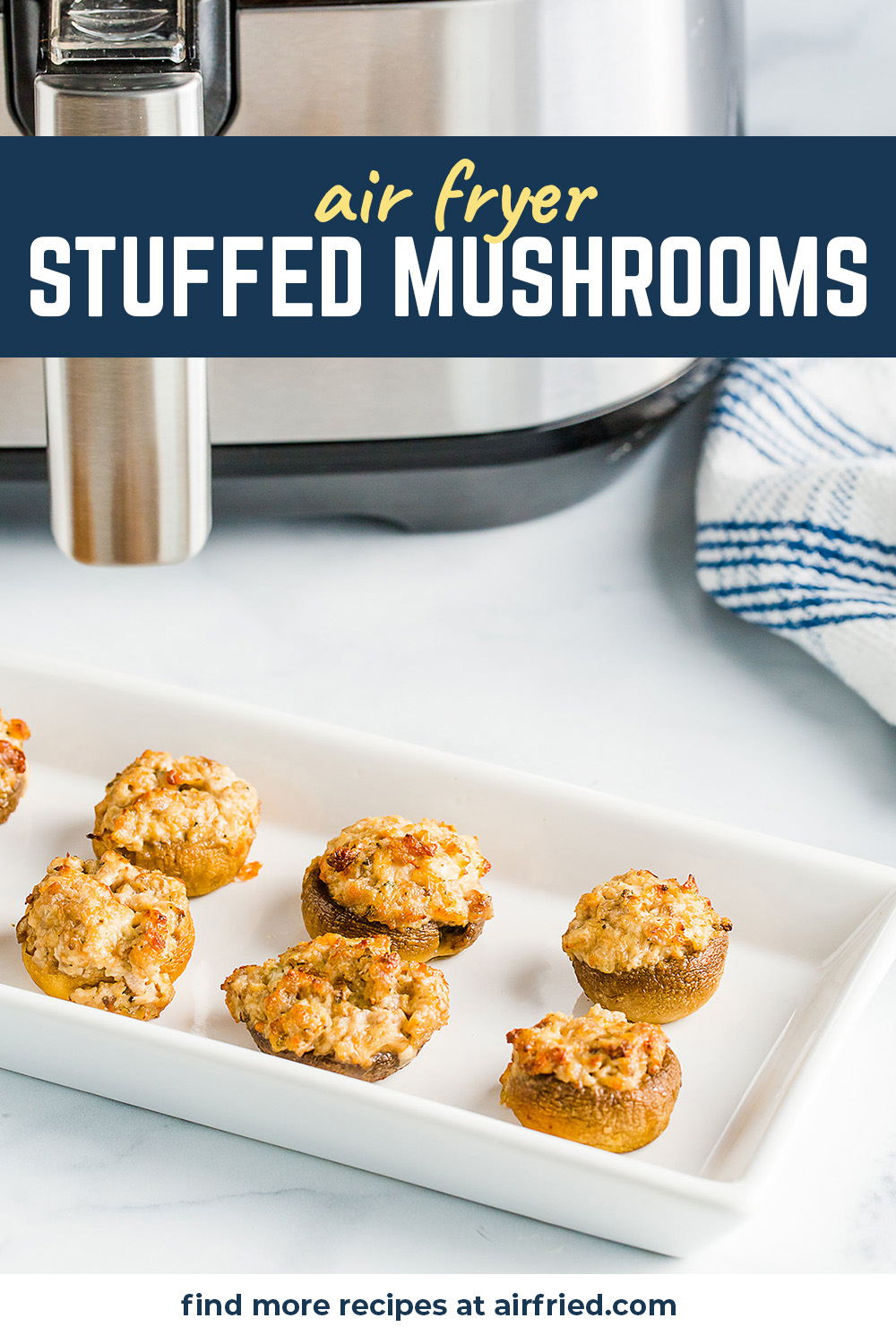An appetizer dish with lined up stuffed mushrooms.