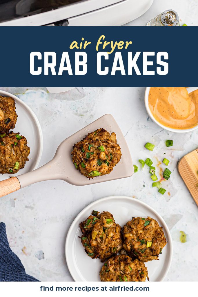 A spatula scooping up a crab cake