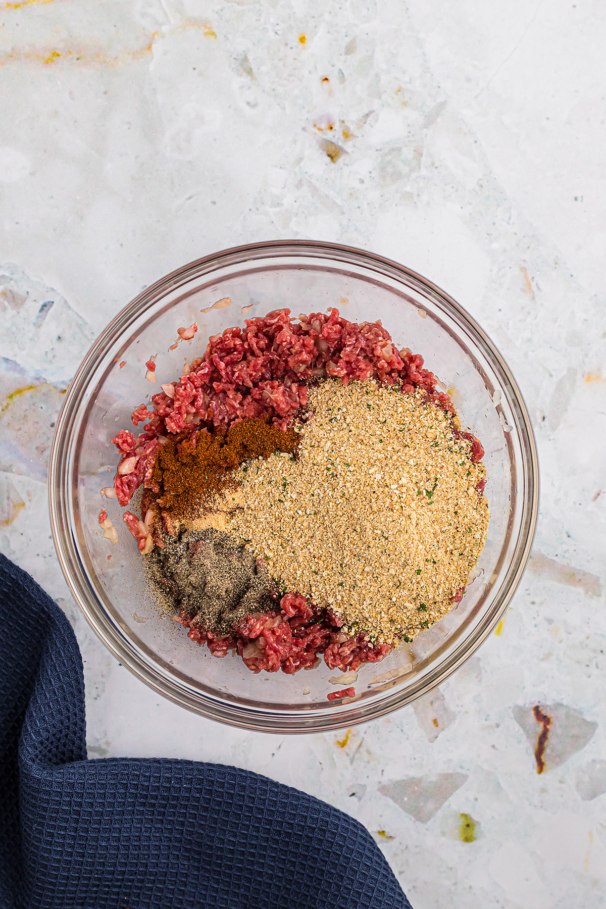 meatball mixture in glass bowl.