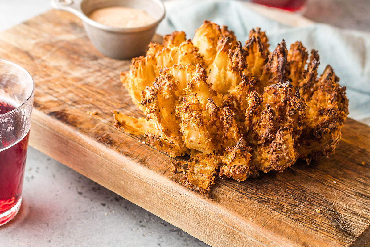 Crispy Air Fryer Blooming Onion With Spicy Dipping Sauce Airfried Com