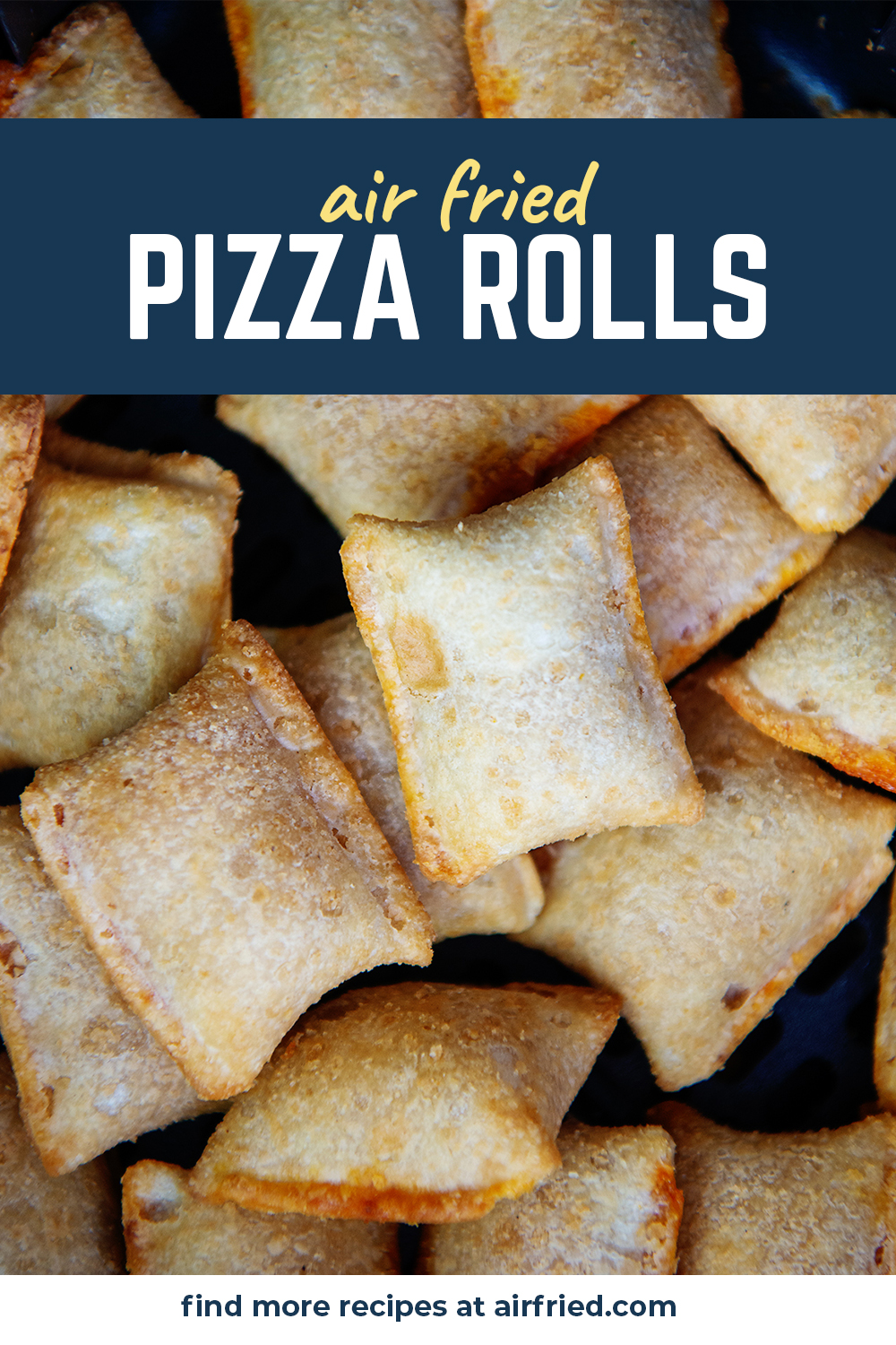 Close up of pizza rolls stacked up in an air fryer basket.