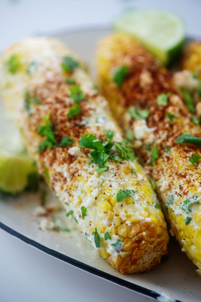 Close up of mexican street corn on the cob