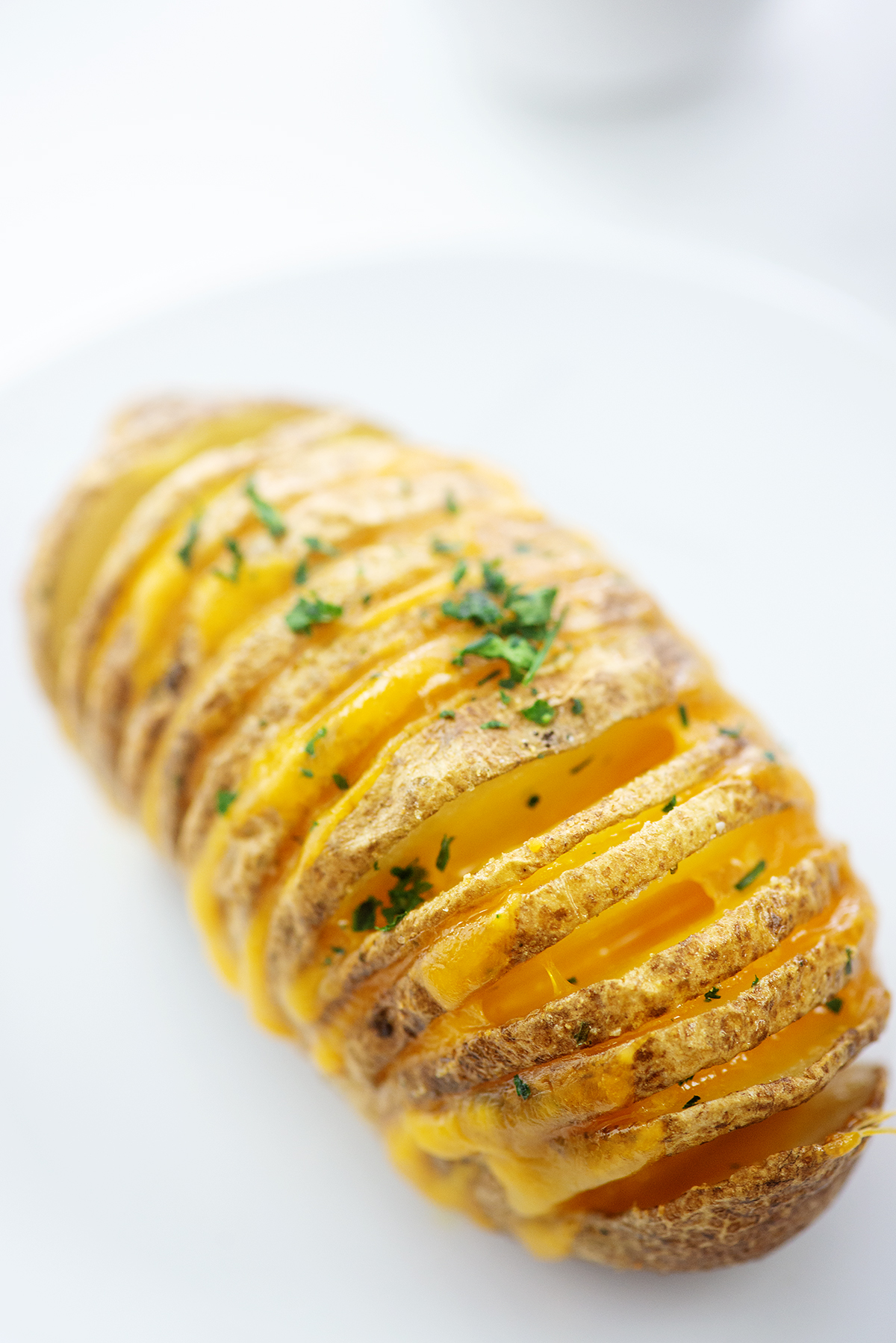 Cheesy Hasselback Potatoes with Bacon