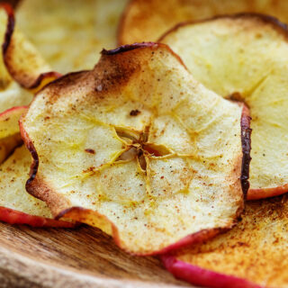 A close up of cinnamon flavored apple chips