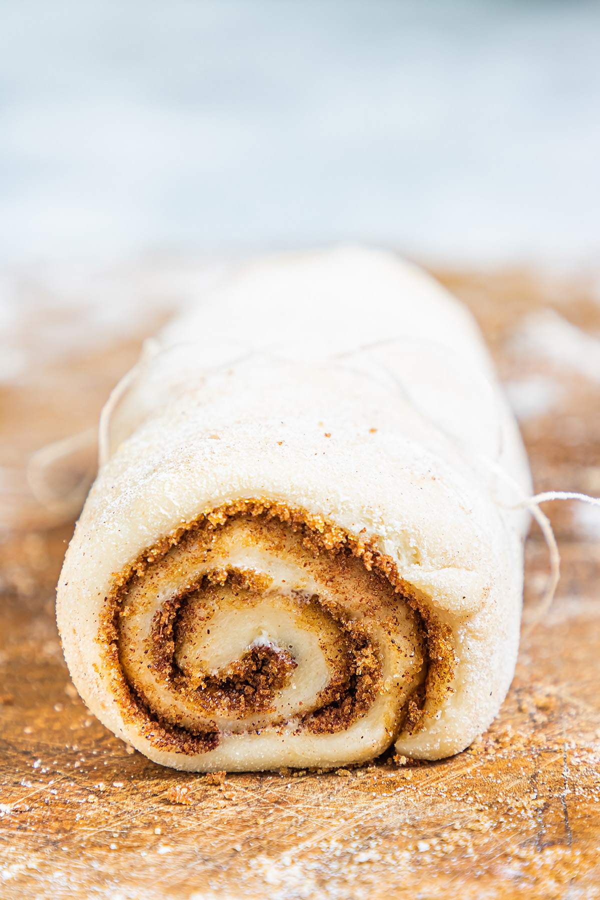 a roll of cinnamon and dough
