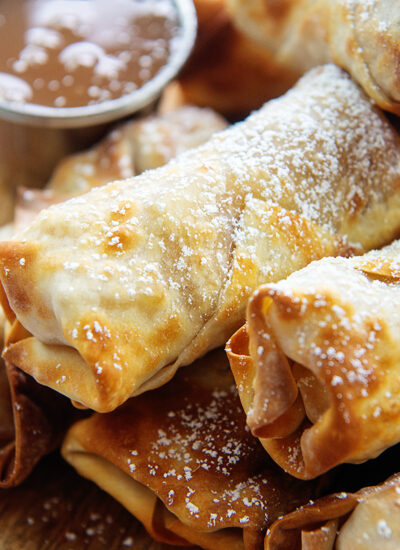 Close up of a pile of apple pie egg rolls