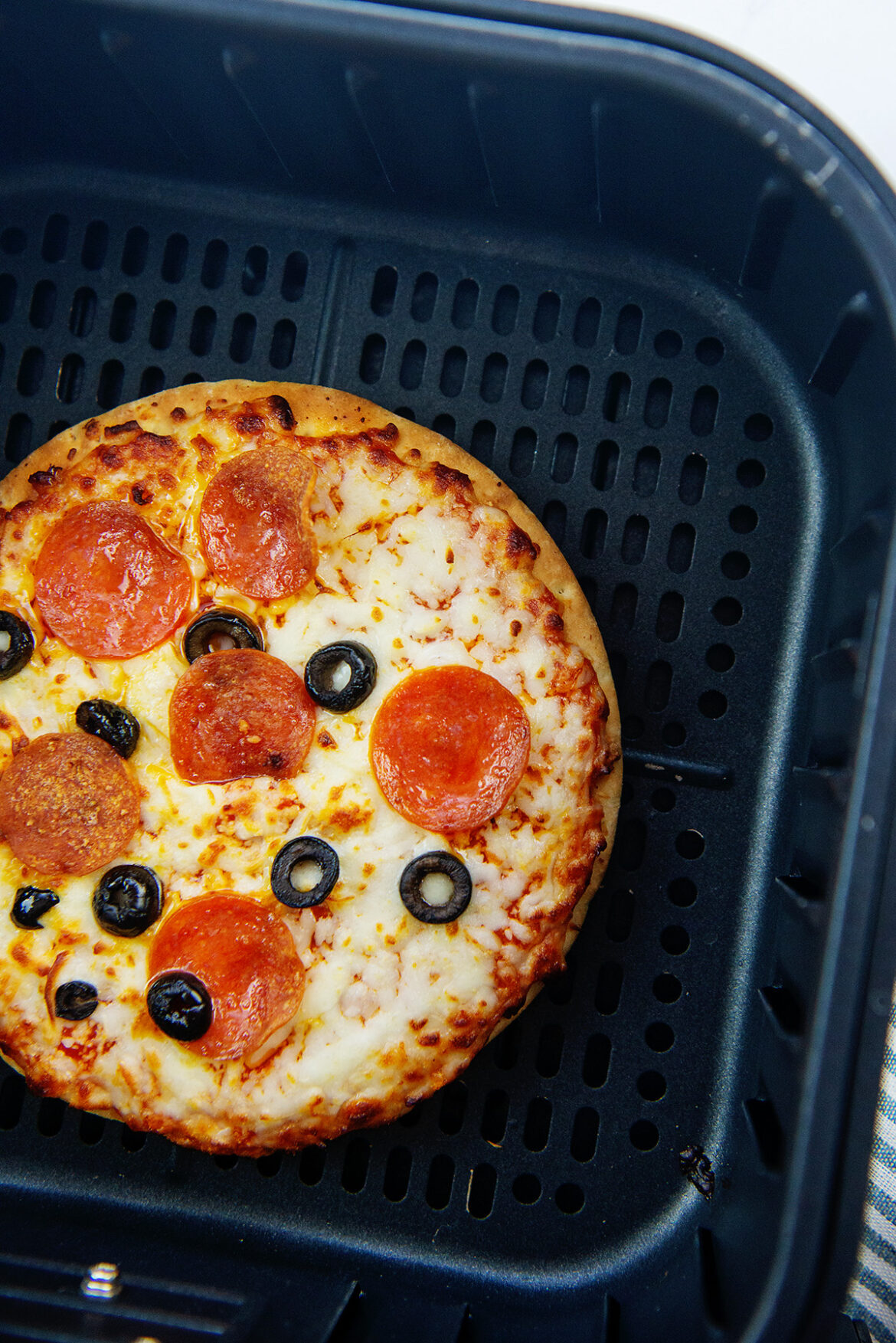 Air Fryer Frozen Pizza in Less Than 10 Minutes! | Airfried.com