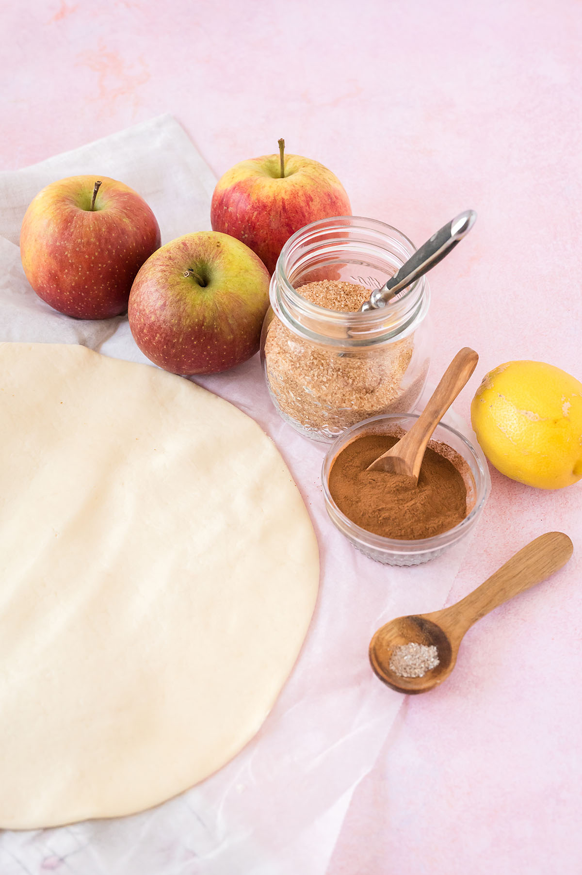 Ingredients for an apple galette on a countertop.