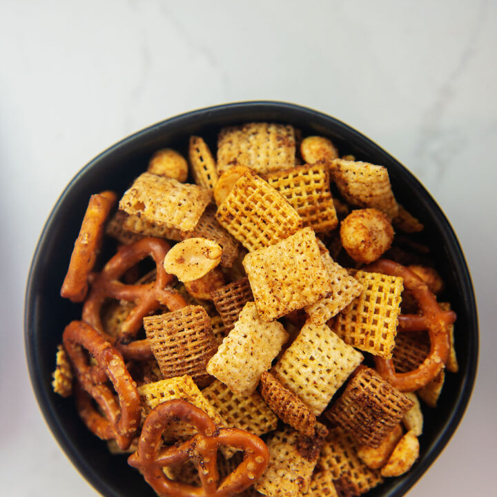 Overhead view of a bowl of Chex mix.