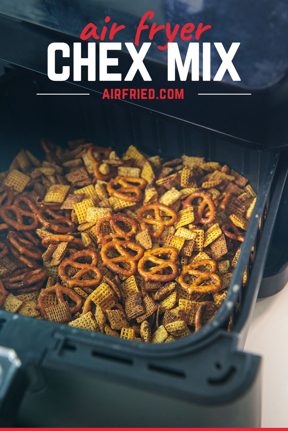 We used our air fryer to make a flavorful, traditional Chex mix!  Super easy, super yummy!