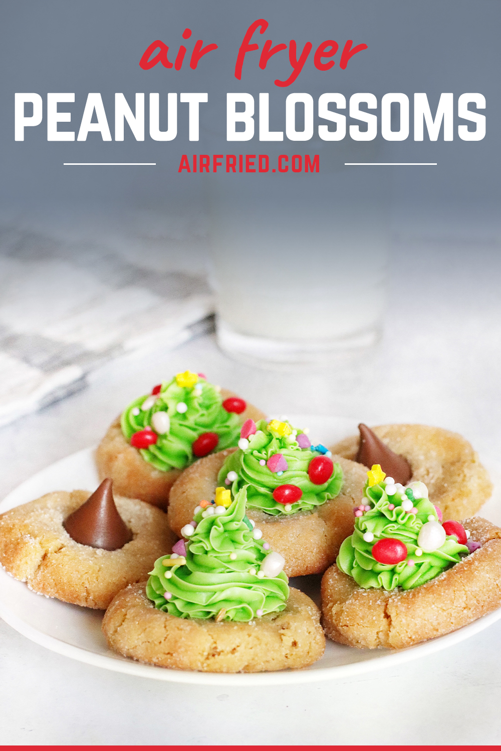We took the best tasting Christmas cookie and made it pretty by topping them with Christmas trees made out of icing!