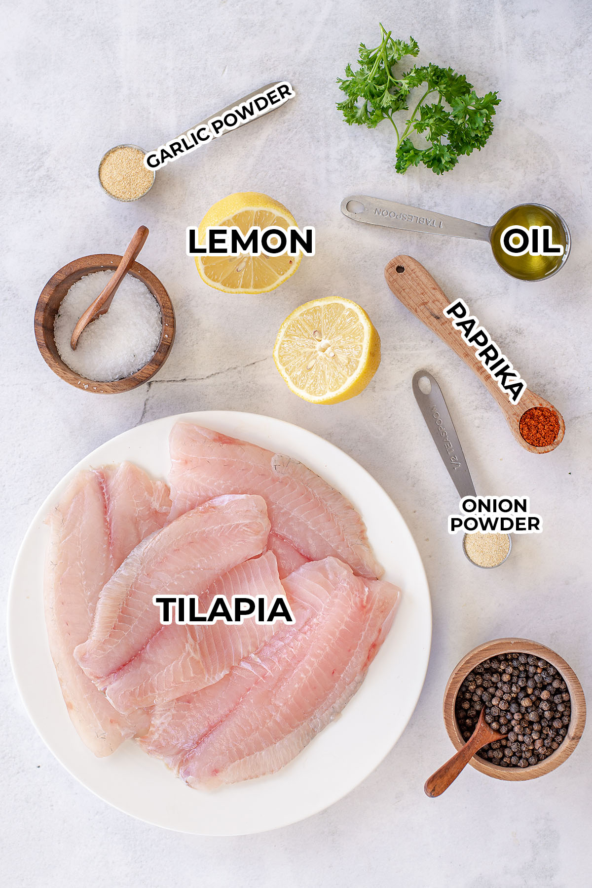 Tilapia ingredients spread out on a countertop.