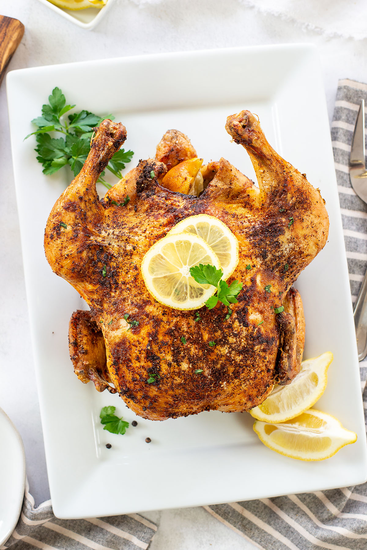 roasted chicken on white plate.