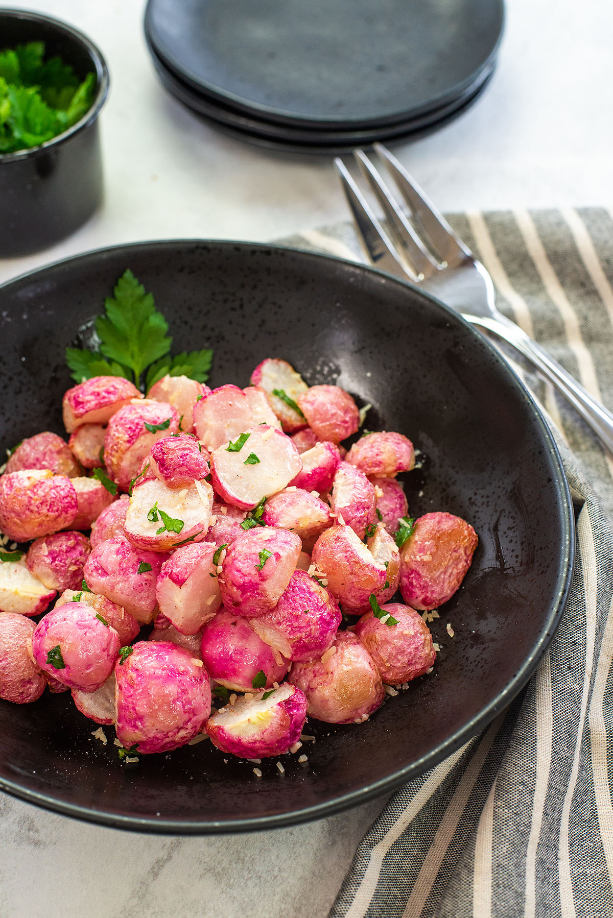 bowl of cooked radishes.