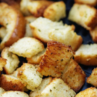 Close up of cooked crouton cubes.
