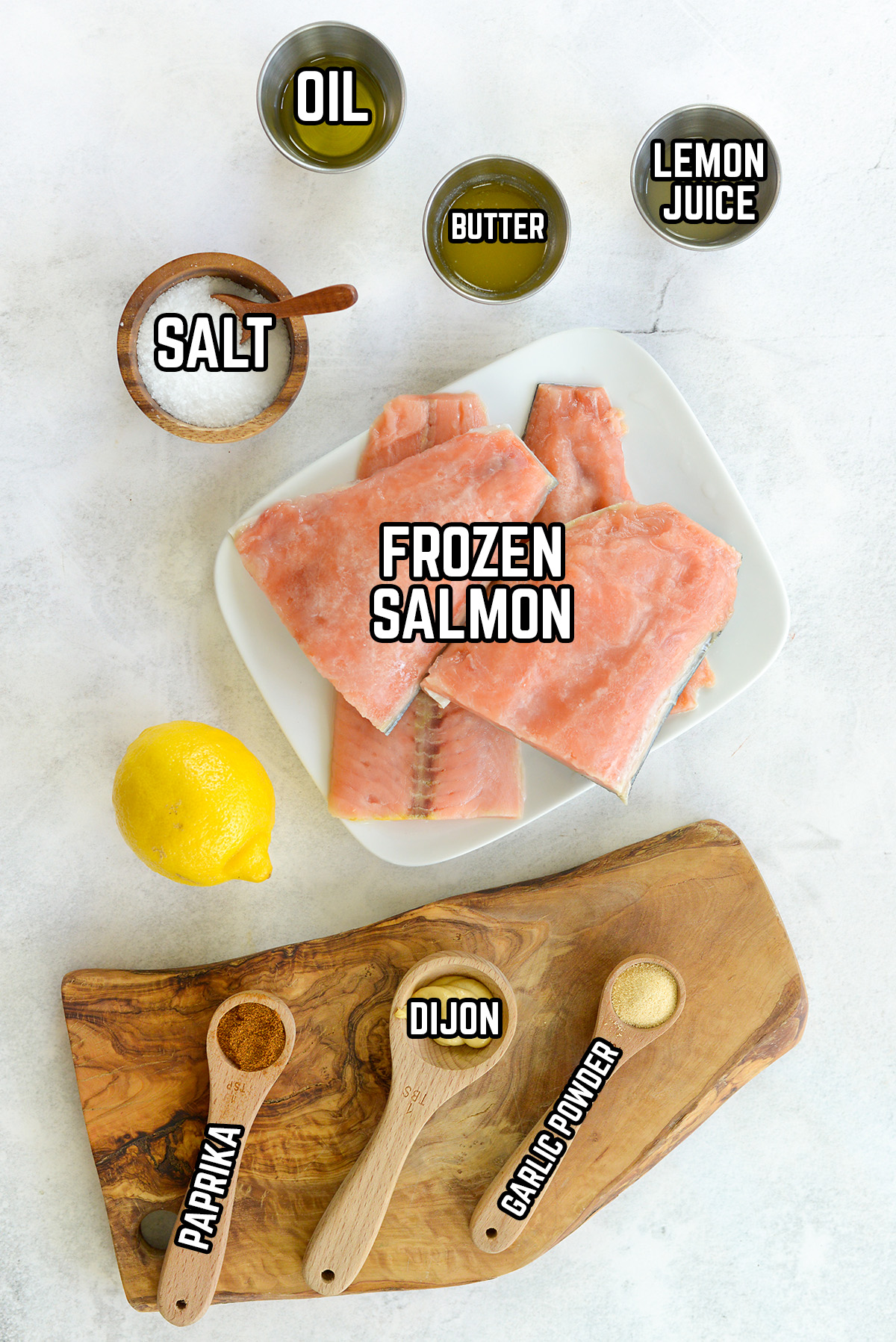 Air fryer salmon fillet ingredients spread out on a countertop.