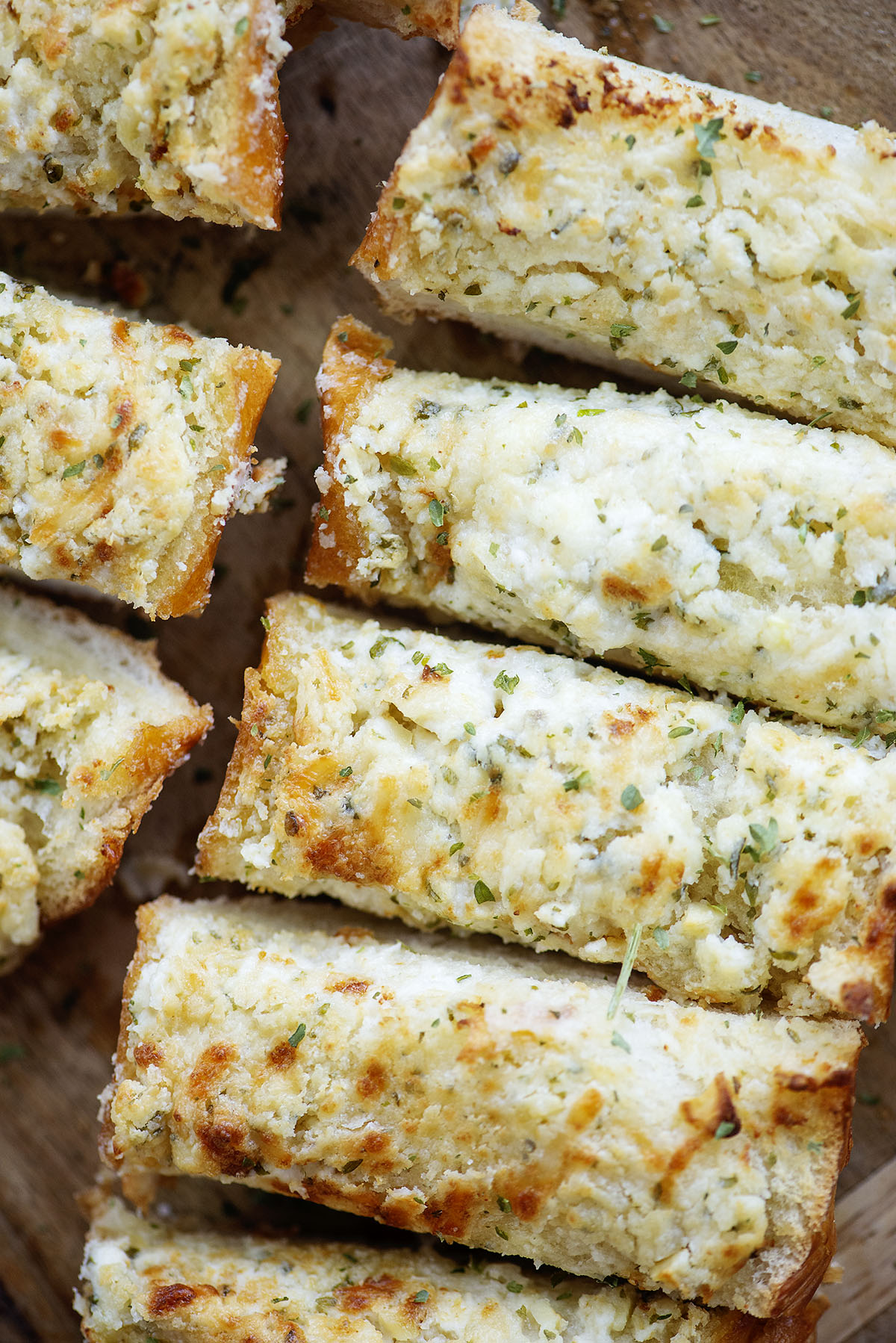 Overhead view of sliced garlic cheese bread.