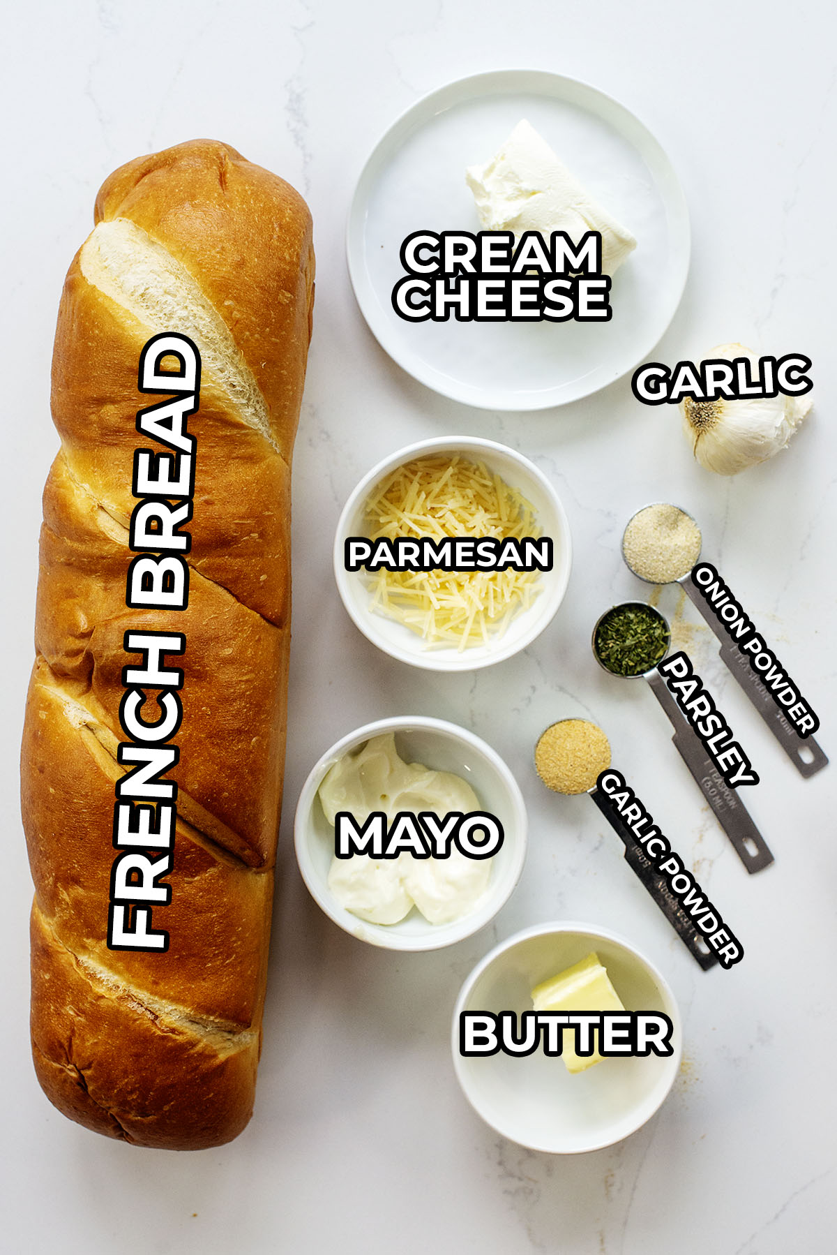 Garlic cheese bread ingredients on a countertop.