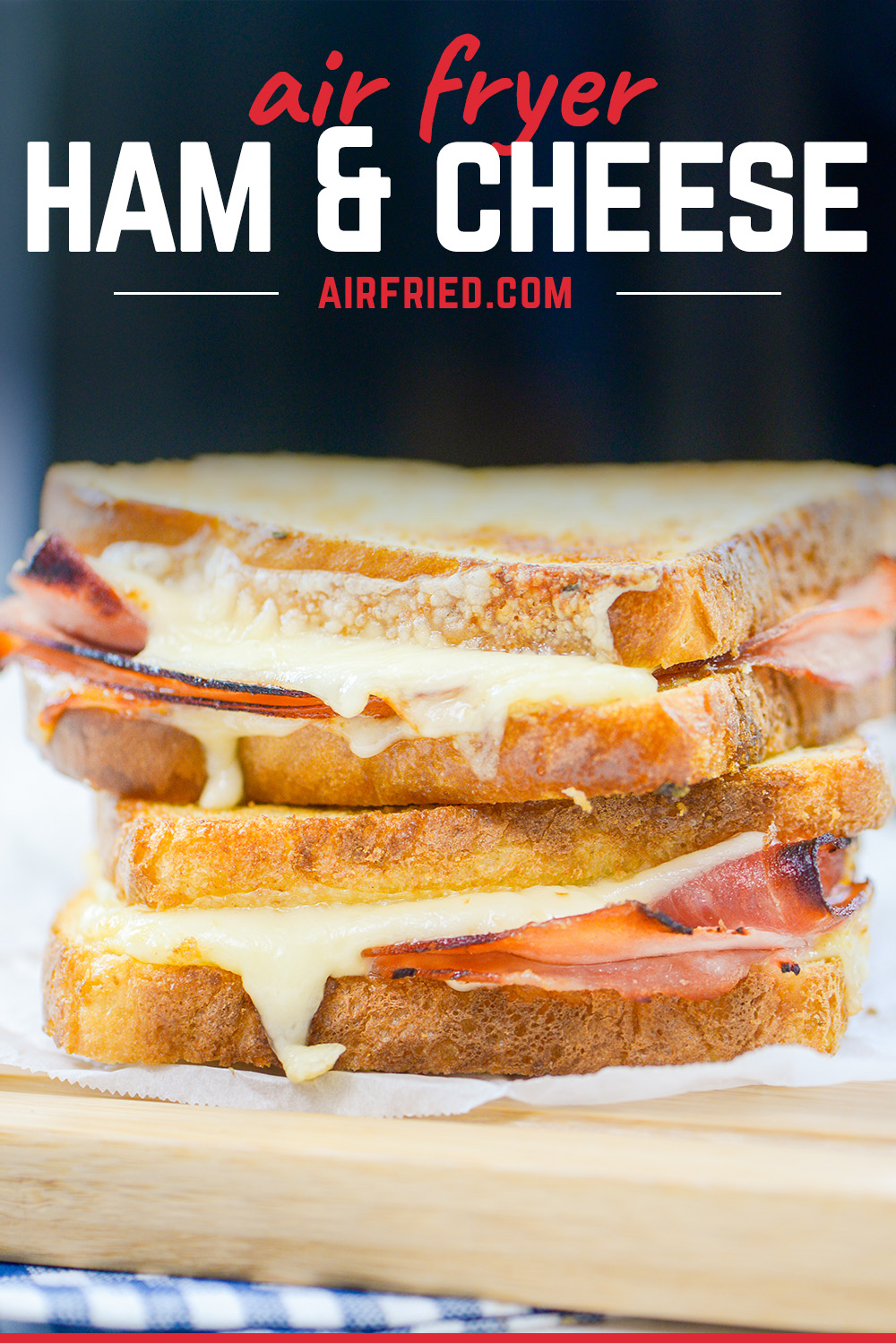 This Air Fryer Hot Ham and Cheese Sandwich is crispy and buttery on the outside and loaded with melty cheese, deli ham, and a creamy sauce on the inside! This sandwich makes the perfect lunch.