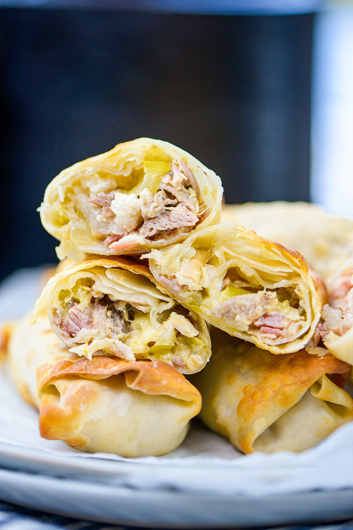 Close up of a stack of Cuban egg rolls.