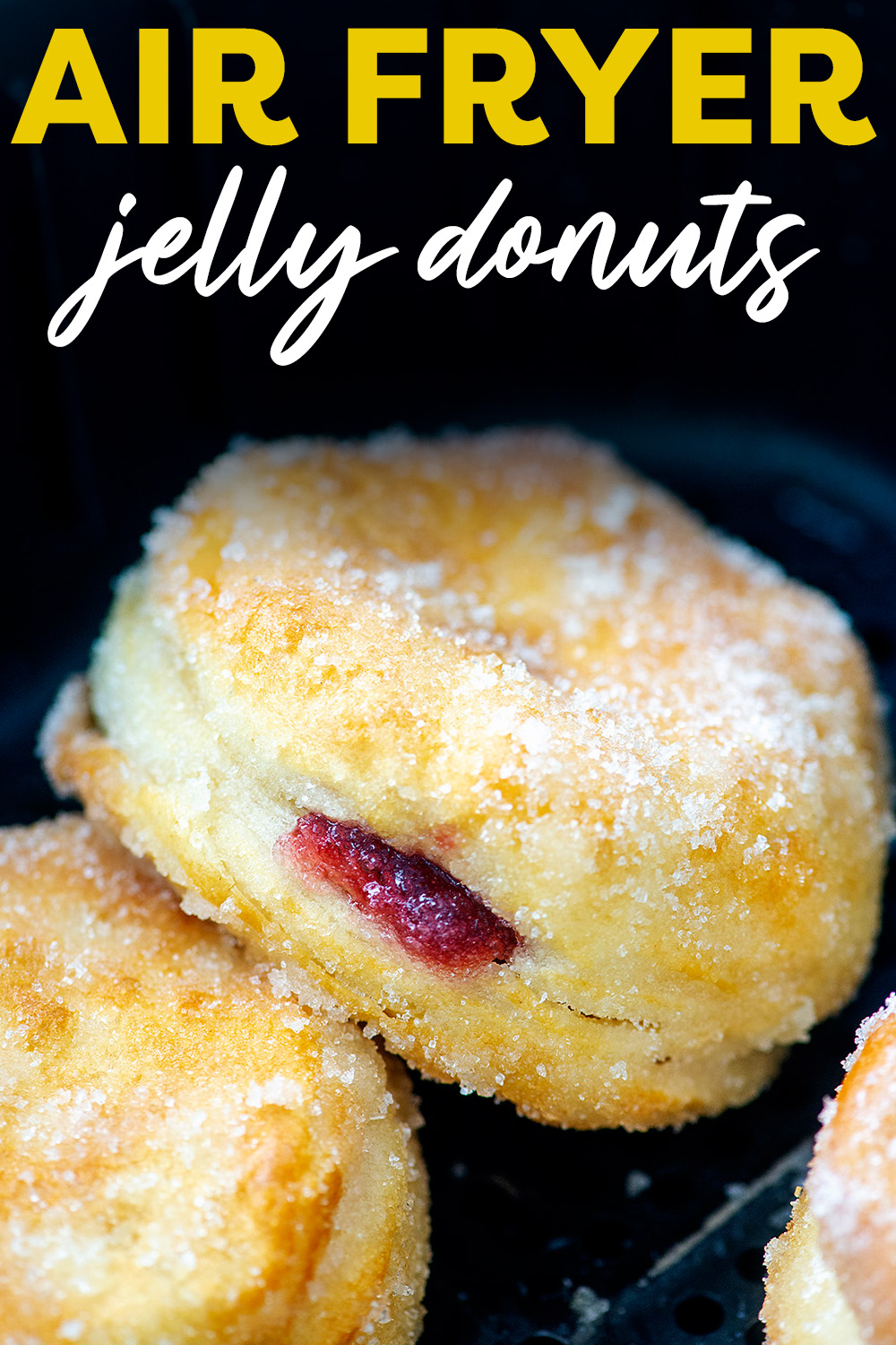 These homemade air fryer jelly donuts are super simple to make!  The air fried biscuit base is amazing and the warm jelly center goes perfect with this donut!
