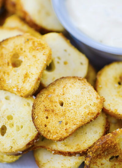 Close up of cooked bagel chips.