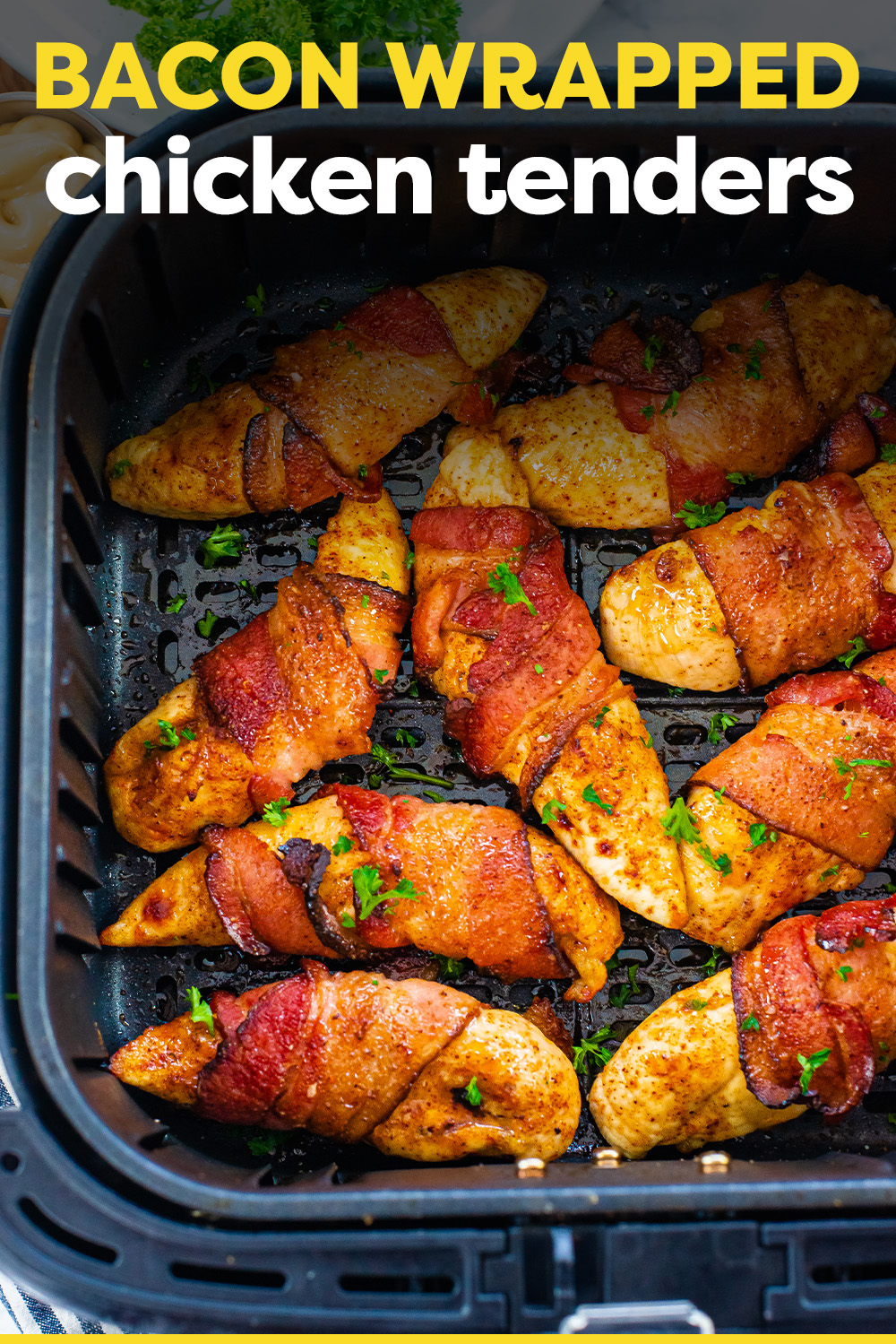 These chicken tenders are wrapped in bacon and then air fried!  The bacon comes out crisp and the tenders nice and moist!