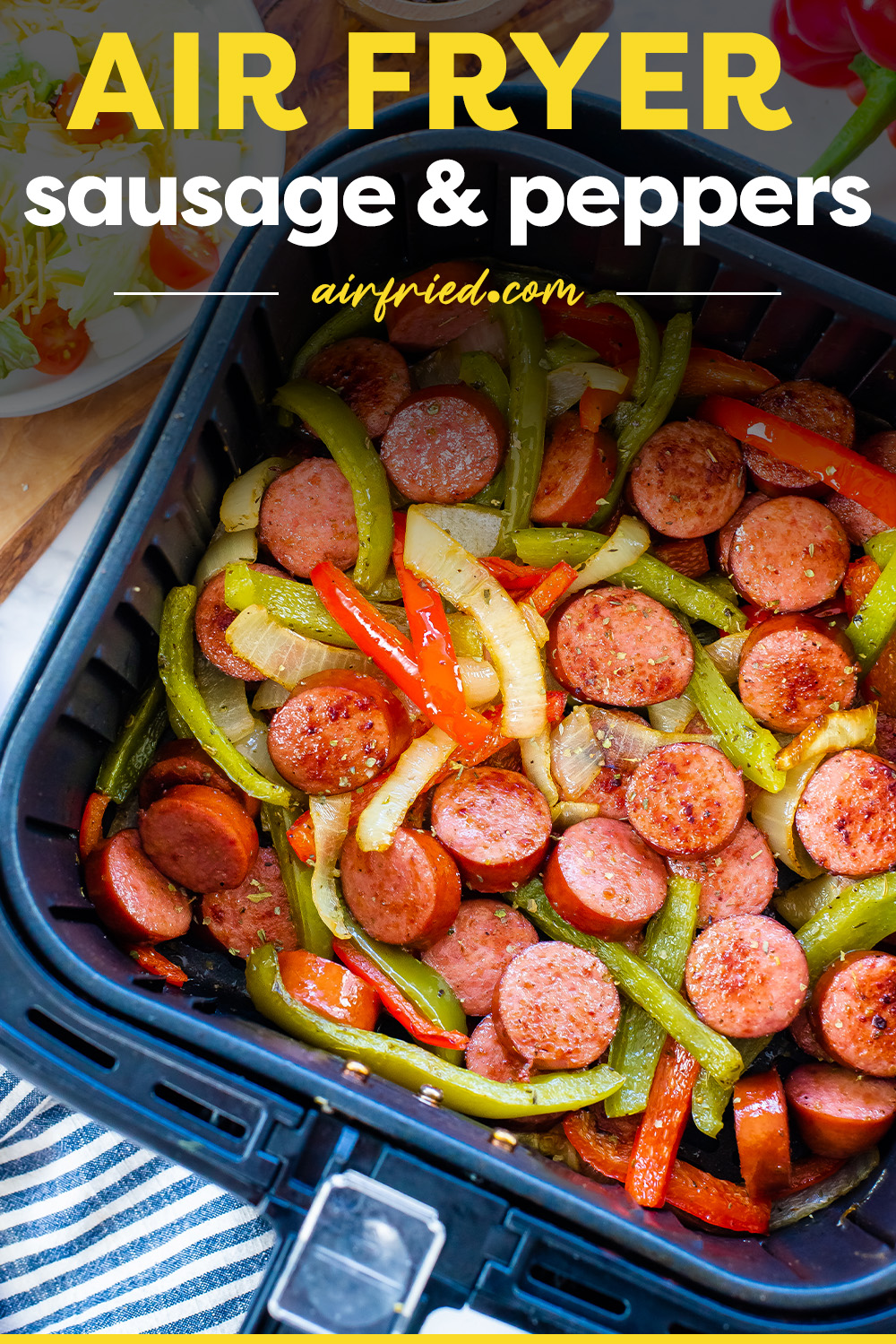 The sausage really pops next to the onions and peppers in this recipe!  The use of the air fryer is perfect for blending the flavors of the sausage and the peppers too!