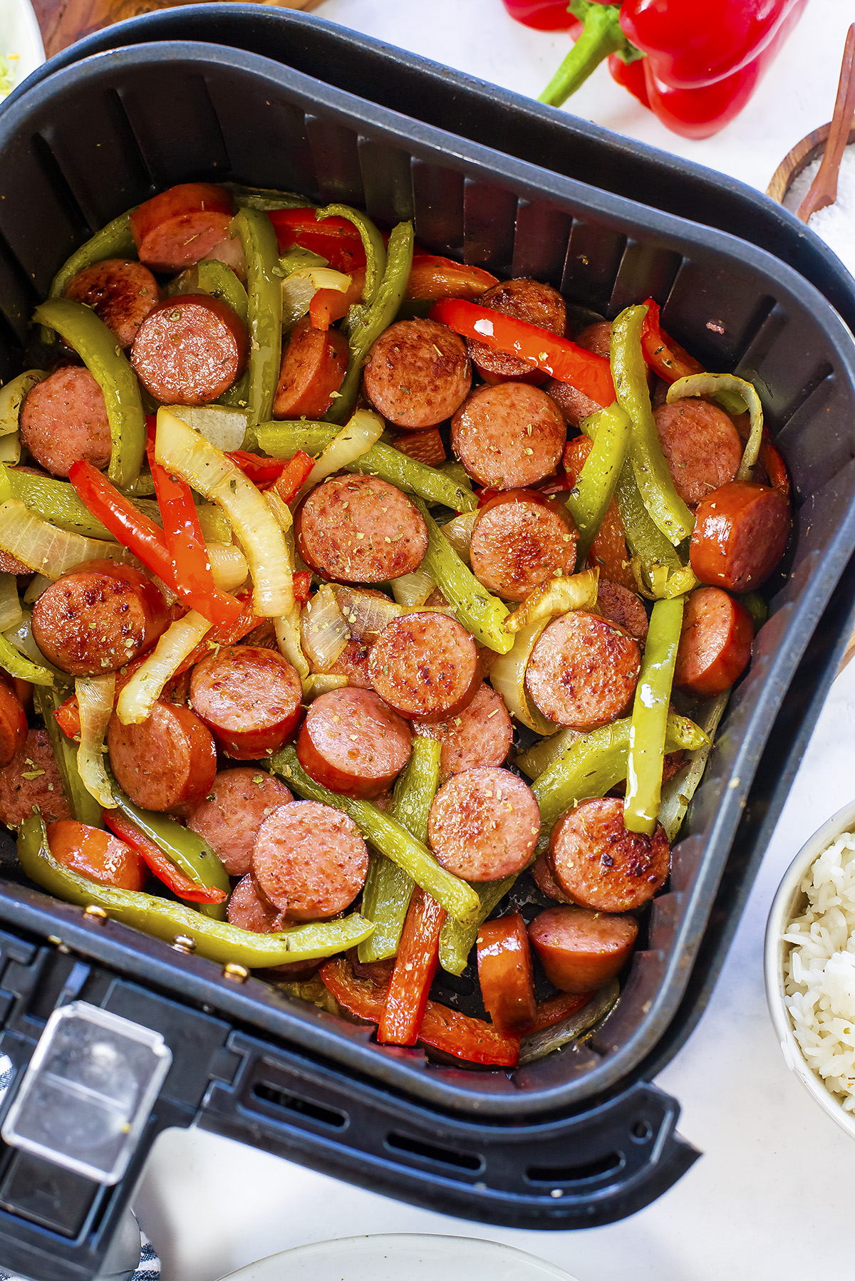 Close up of sausage, peppers, and onions