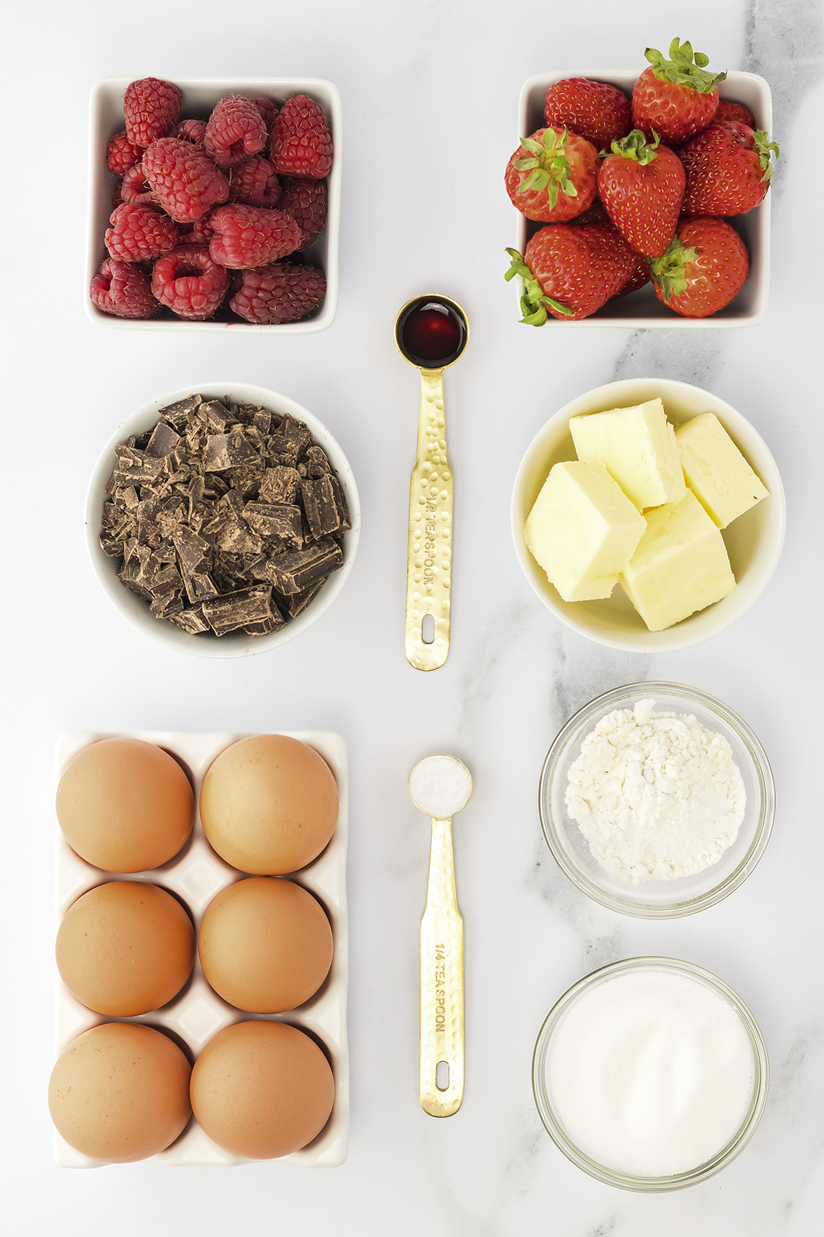 Ingredients for lava cakes on a white countertop.