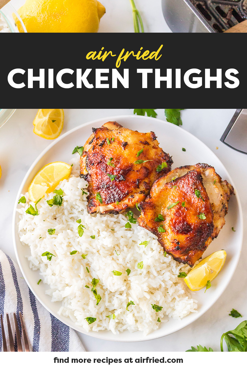 Chicken thighs and rice on a plate.