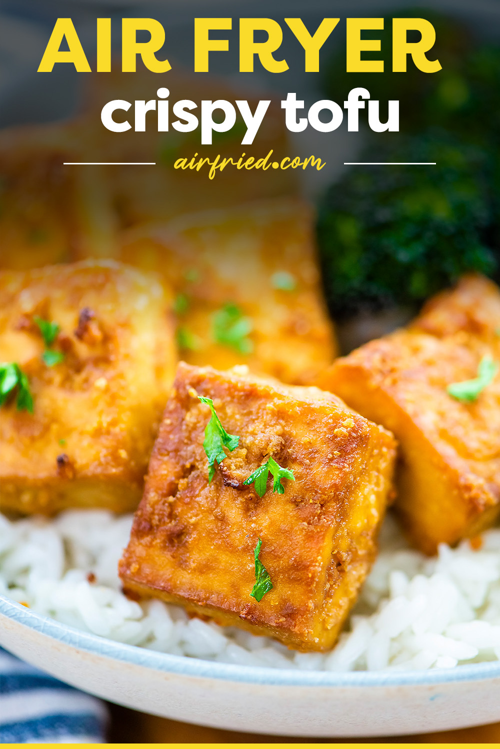 This crispy tofu was made in the air fryer!  It is super simple with a very light breading and some mild seasoning for a great taste!