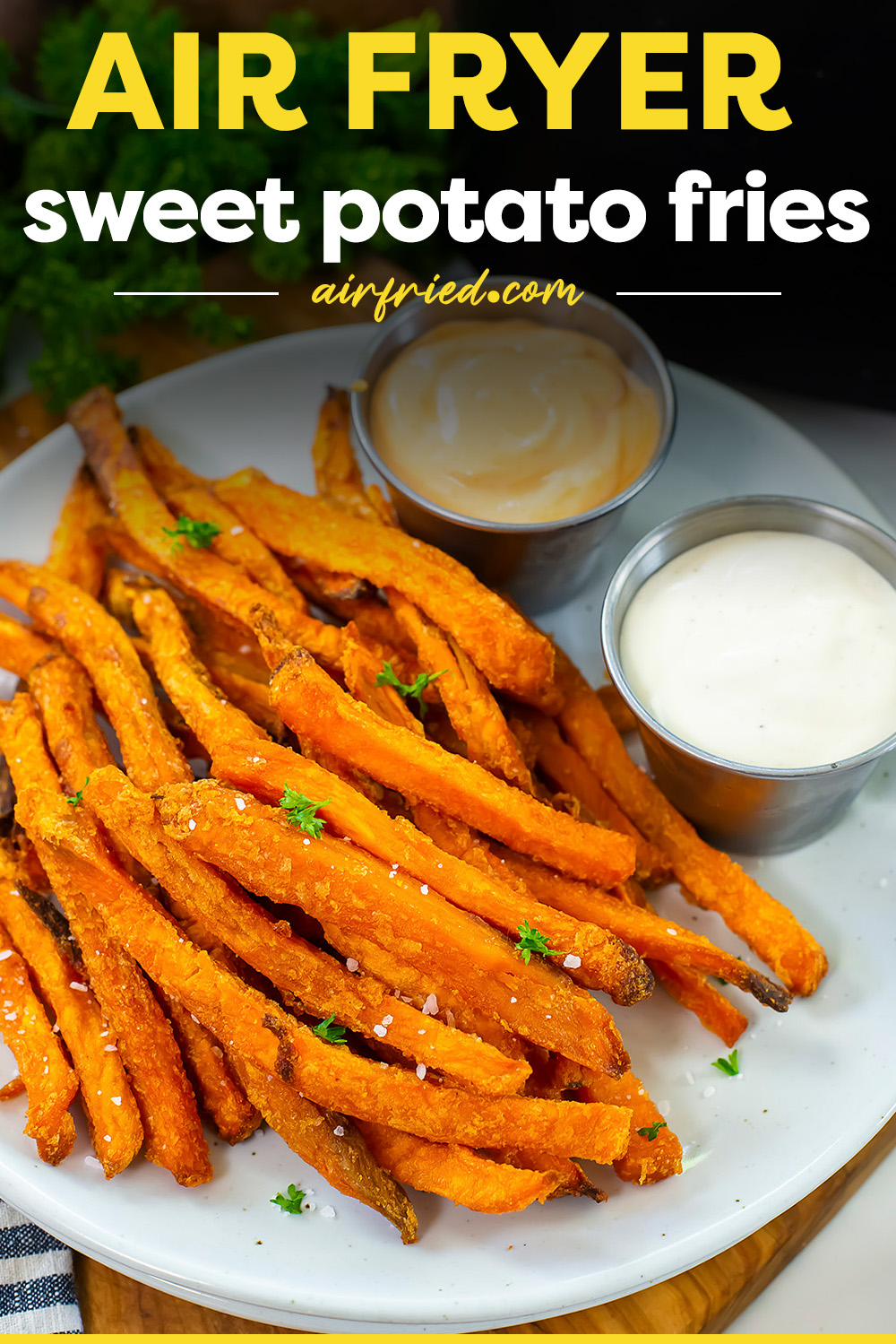 Sweet potato fries next to two dips.