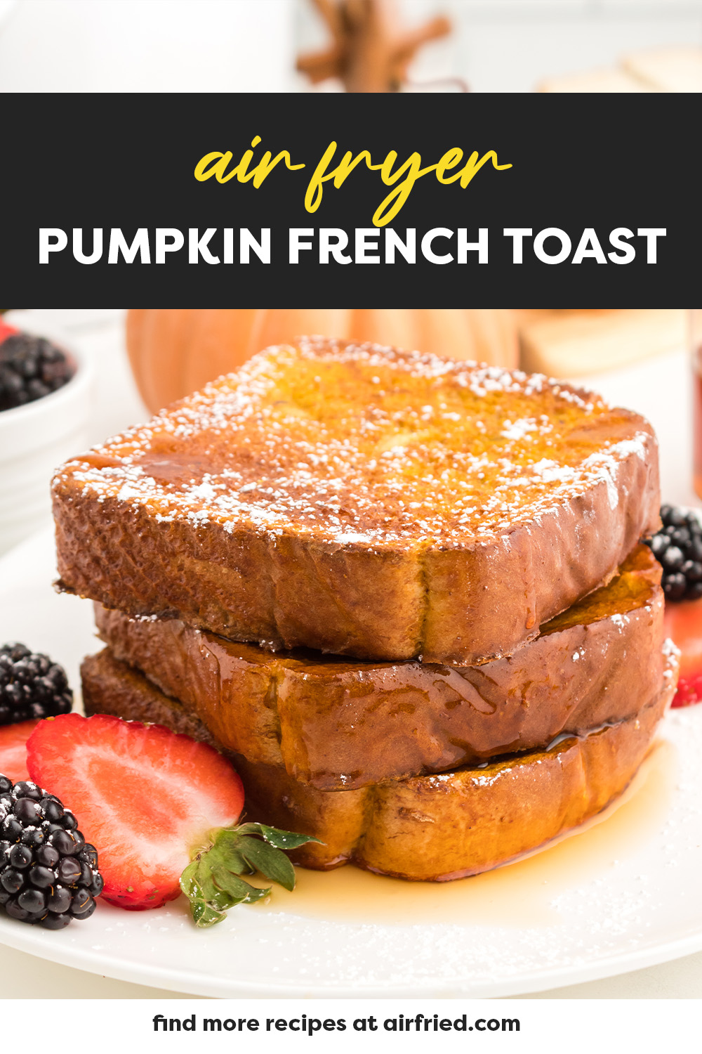Three slices of pumpkin French toast stacked up.