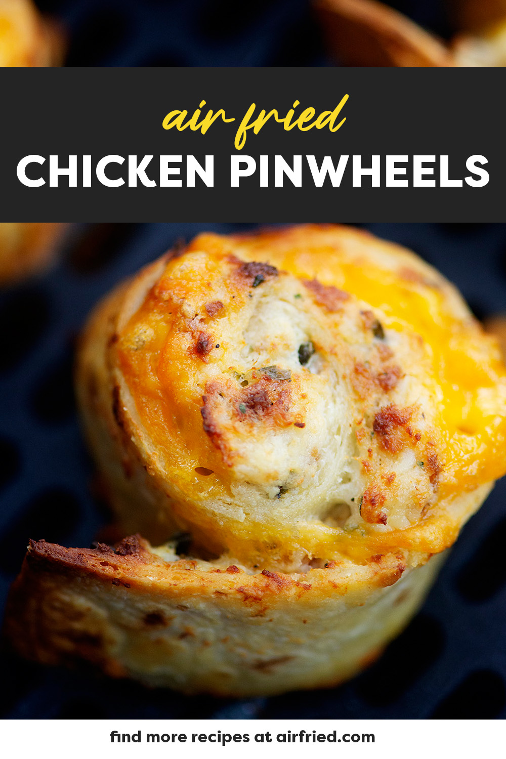Very close picture of a chicken pinwheel in an air fryer basket.