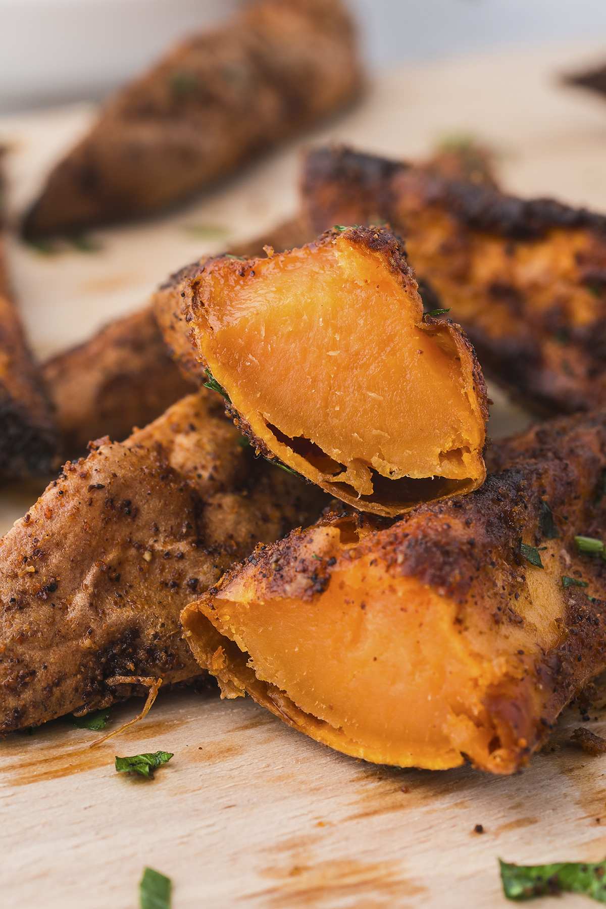 Close up of a sweet potato wedge cut in half.