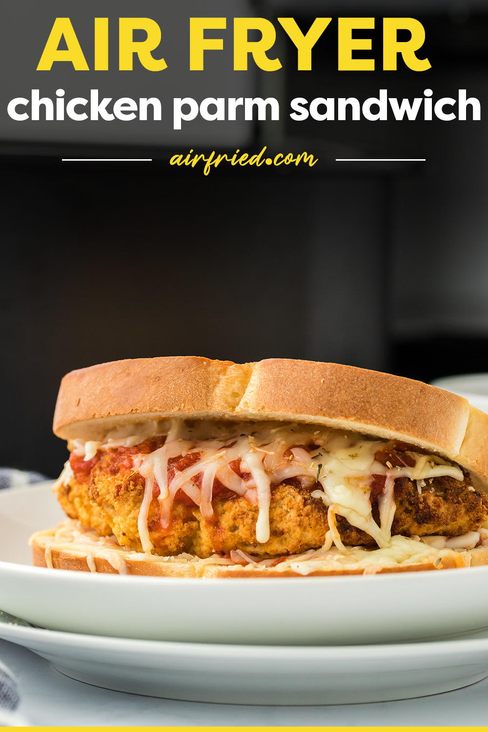 We used the air fryer to make a cheesy, toasty Chicken Parmesan Sandwich in minutes! This air fryer sandwich features crispy chicken, flavorful marinara, and plenty of cheese! 