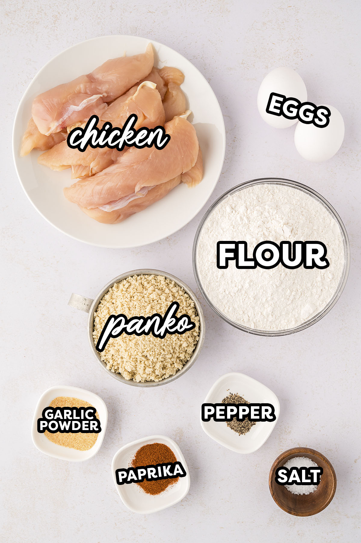 Air fryer chicken tender ingredients on a countertop.