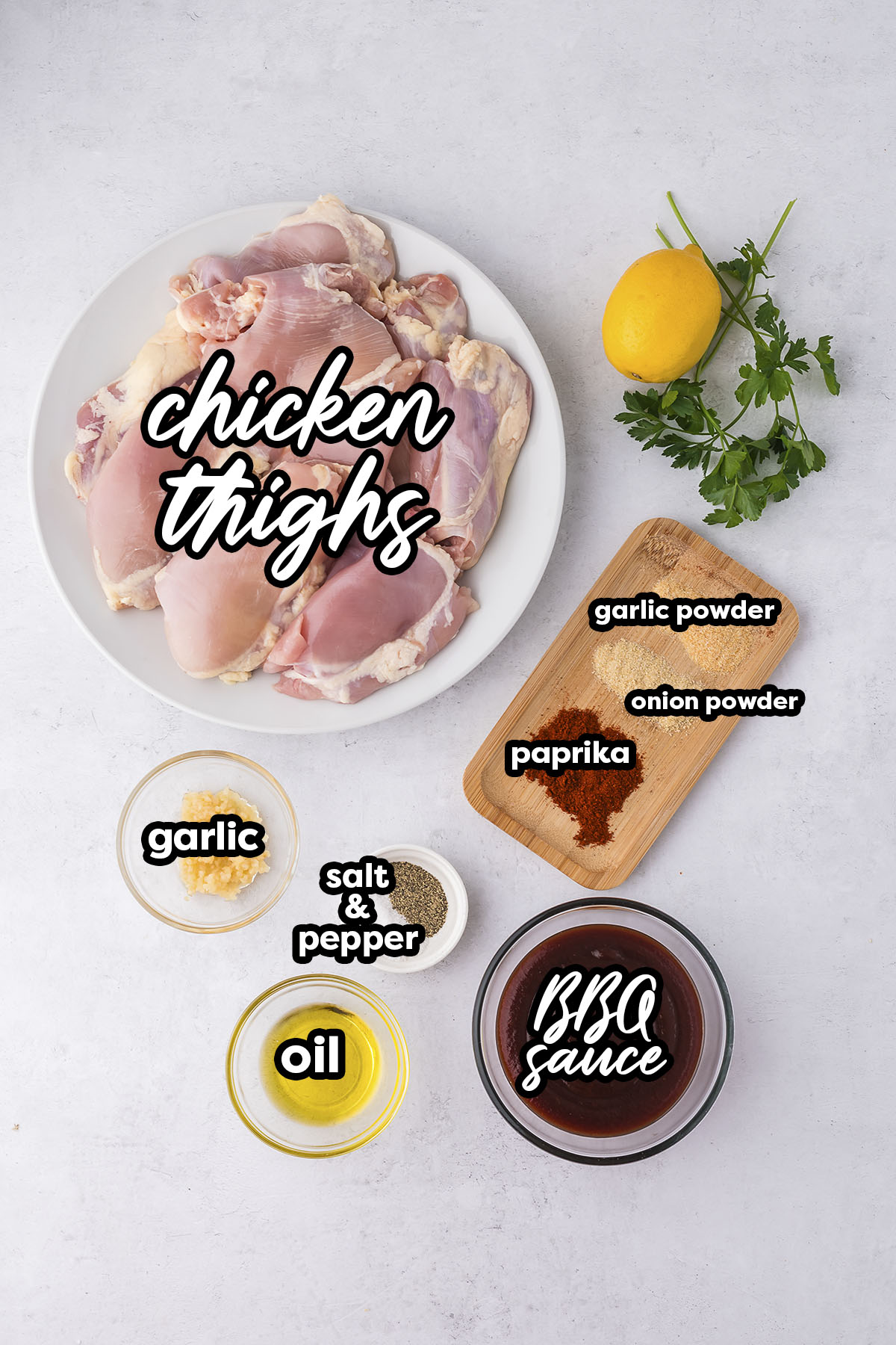 Ingredients needed for BBW chicken thighs on a white countertop.
