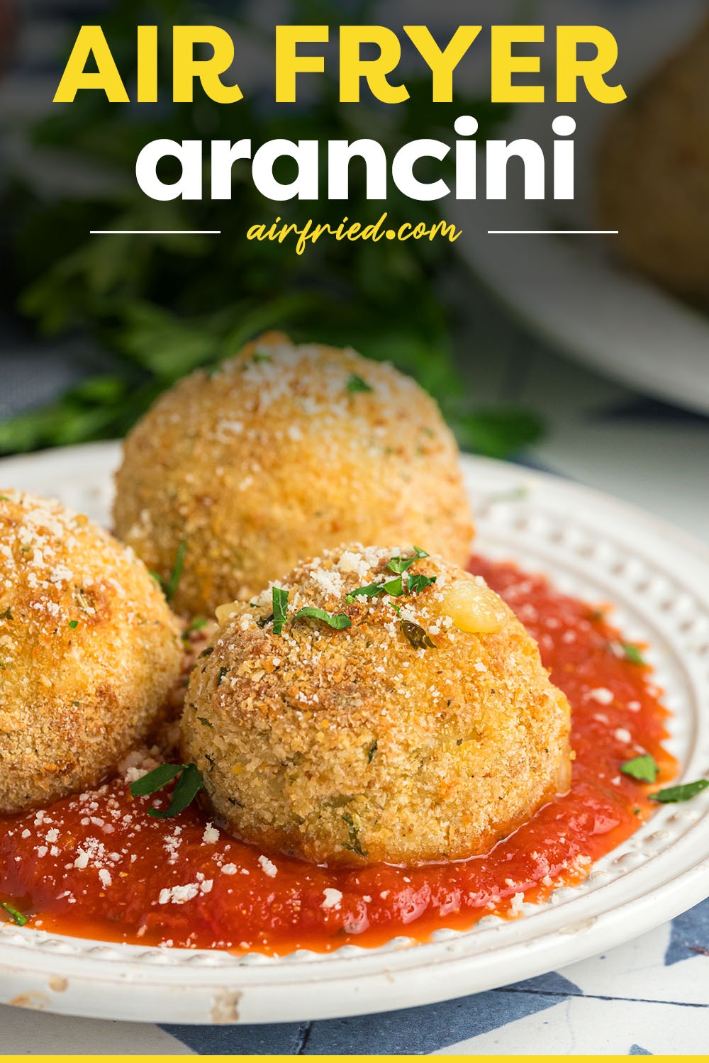 Our air fryer arancini has a ton of flavor in a crispy shell!  The rice is soft and fluffy with perfectly melted cheese in the middle!