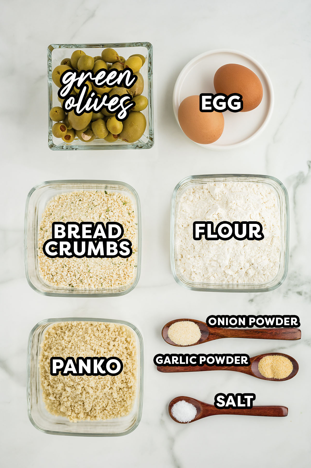 Ingredients needed for air fryer olives on a white countertop.