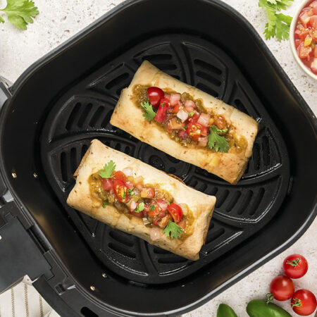 Air fryer chimichanga in basket.