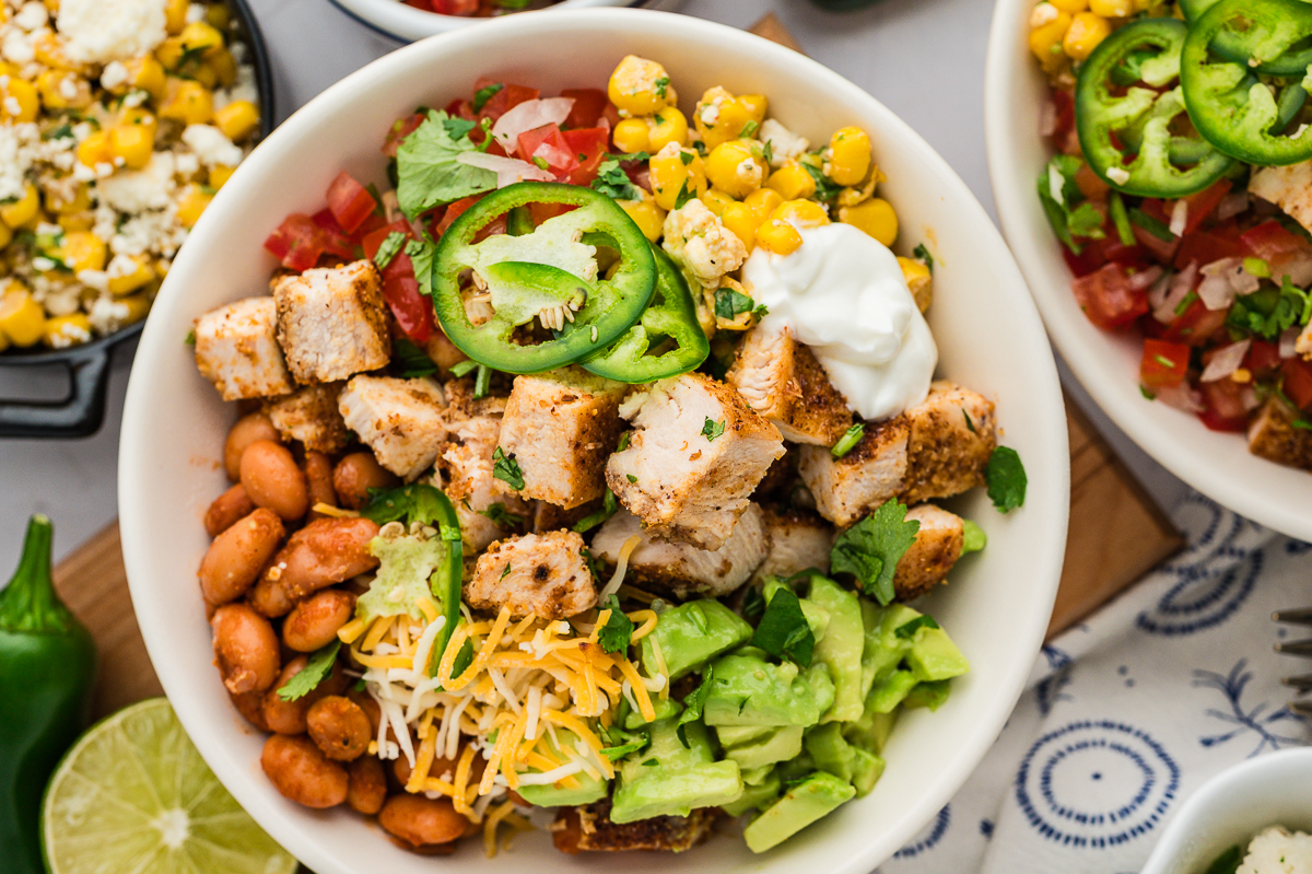 Close up of a ready to serve chicken burrito bowl.